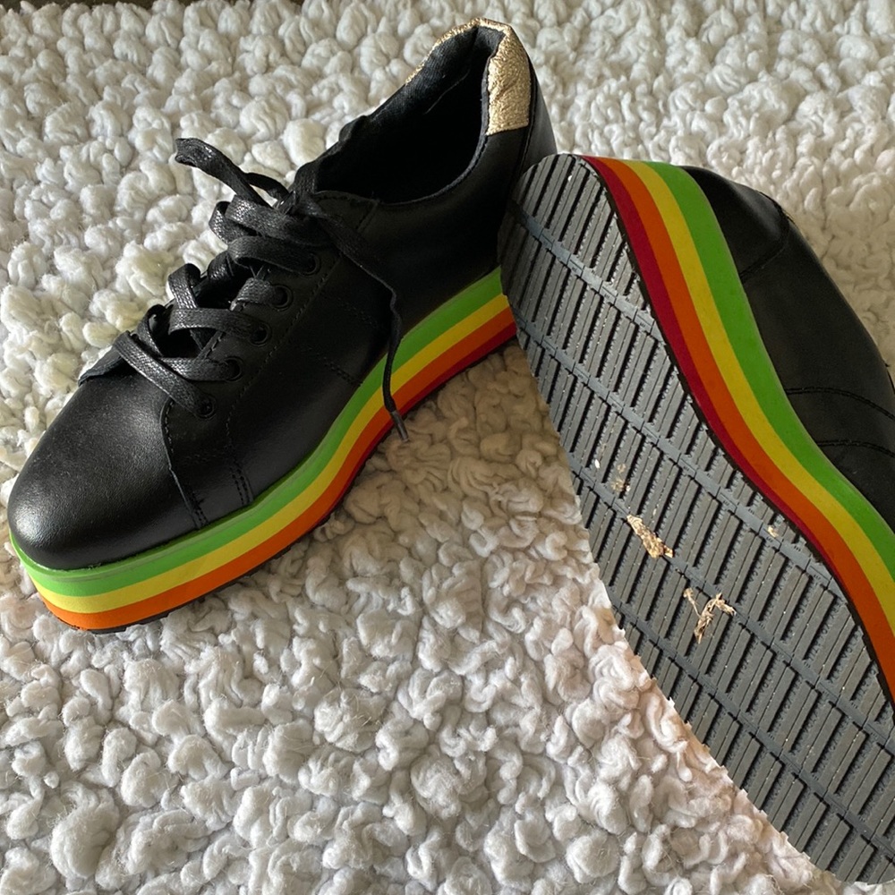 Women size 8  black platform by very volatile sneakers with colors in bottom